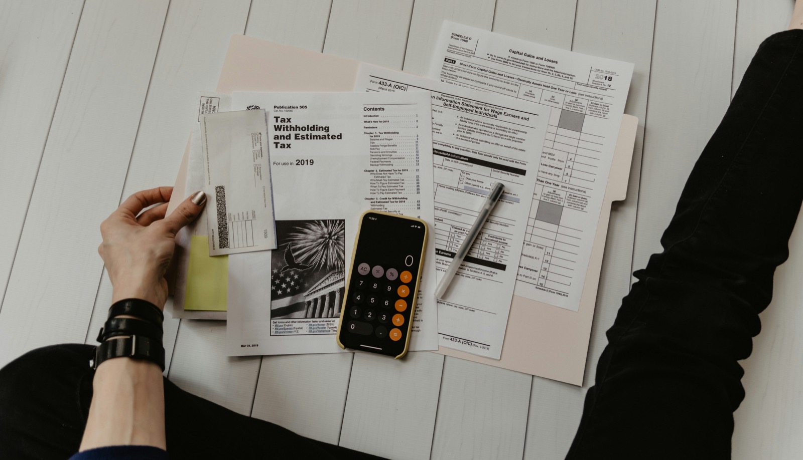 Tax and accounting documents arranged on a desk