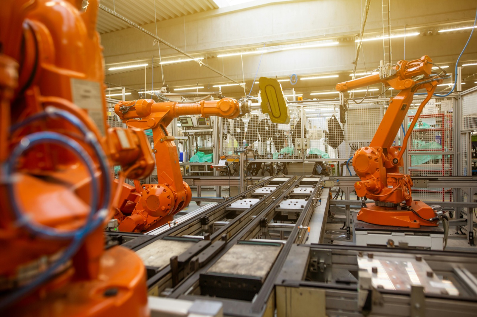 Industrial robotics in a manufacturing plant